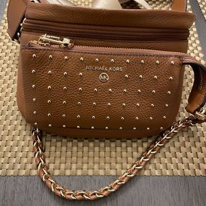 MK Pebbled Leather Sling Pack